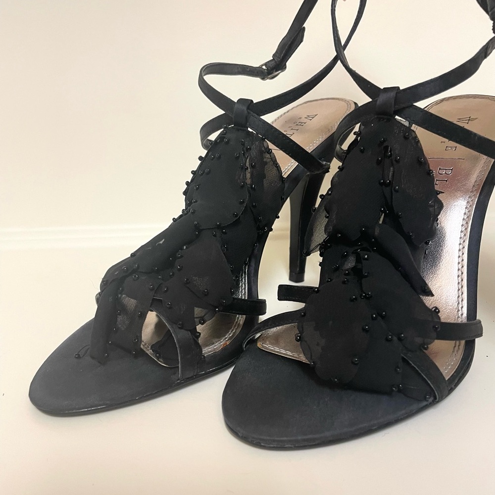 White House Black Market Black Strappy Heels
Chiffon detail on the straps Size 8